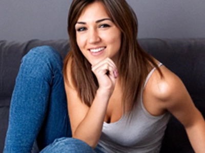 Dark haired shy girl in a grey top and blue jeans is ready to be submissive
